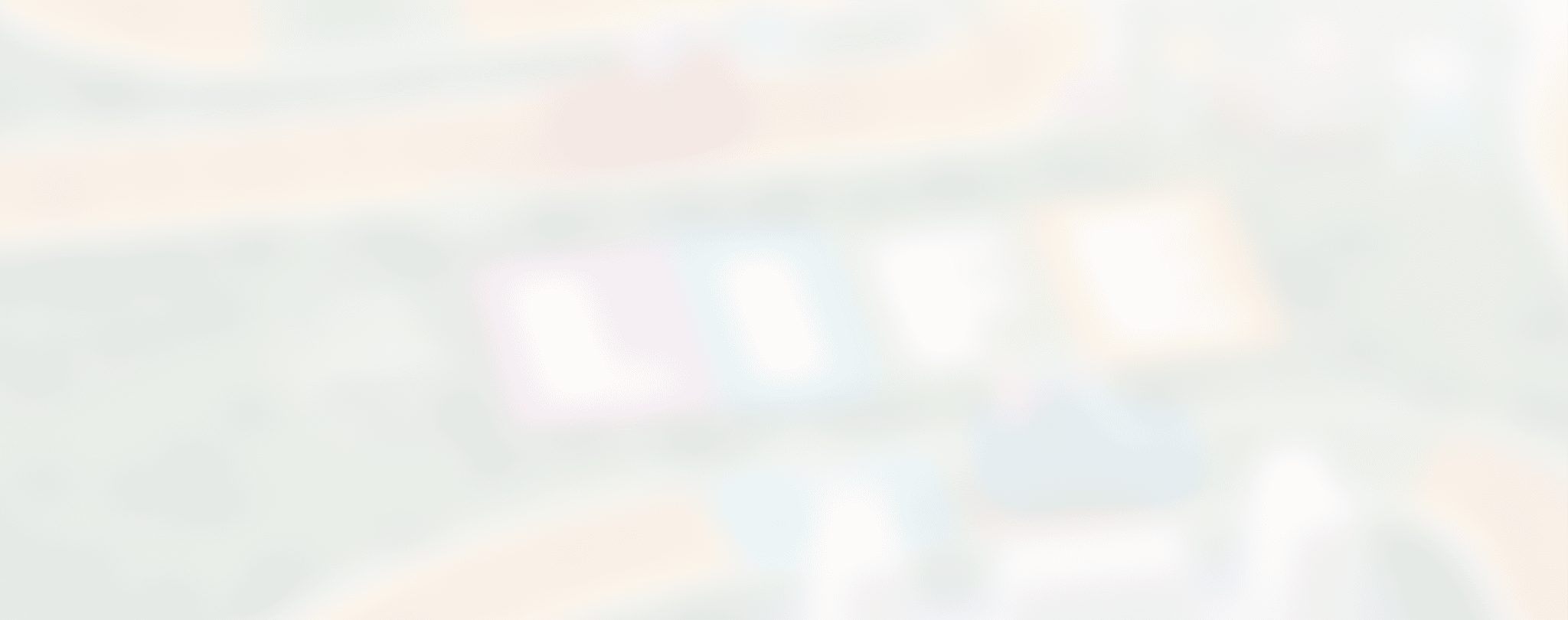 A person wearing a white shirt and blue jeans is sitting on a wooden bench in a park with green grass and trees. Description generated by AI